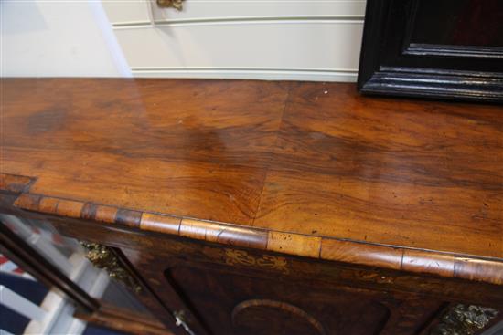 A 19th century French walnut and marquetry breakfront side cabinet, W.5ft 11in. D.1ft 2in. H.3ft 6in.